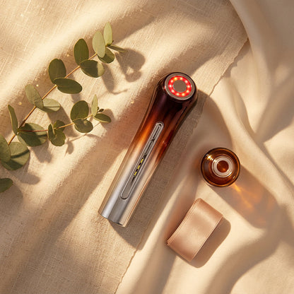 EMS Microcurrent Facial Lifting Device flat lay